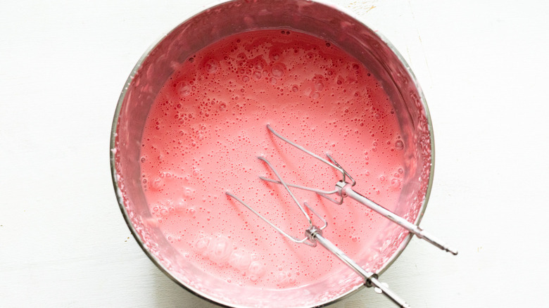 strawberry jell-o in a bowl
