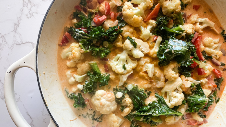 veggie curry cooking in a pan