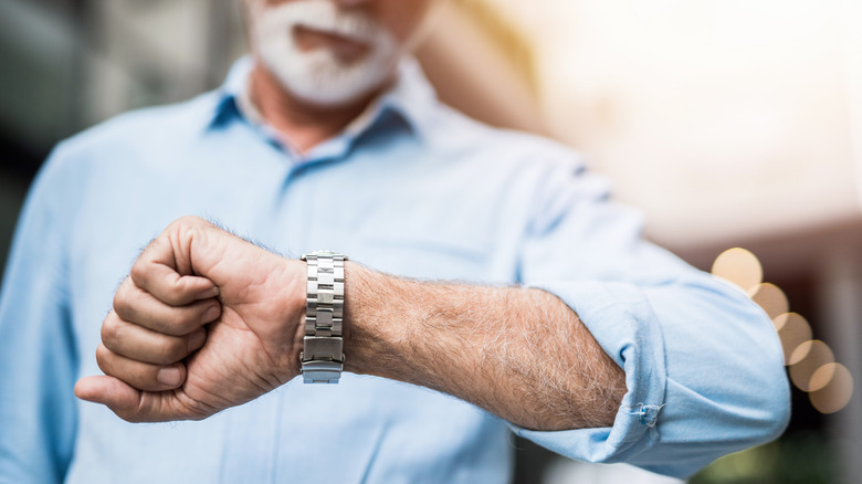 Man checking his wrist watch