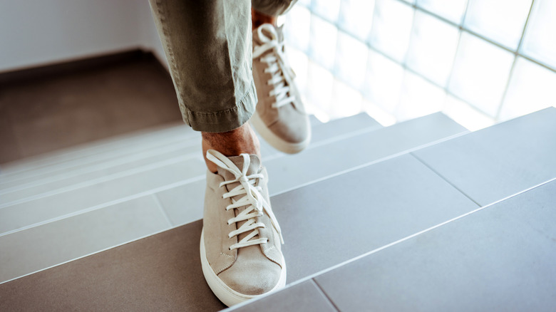 Close up of feet on stairs