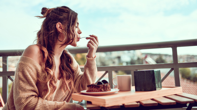 Woman eating dessert  