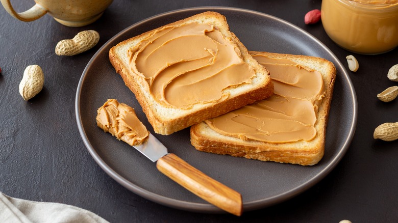 peanut butter spread on white bread