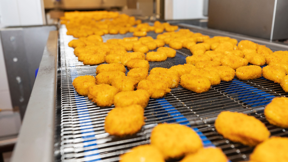 Chicken nuggets on a production line