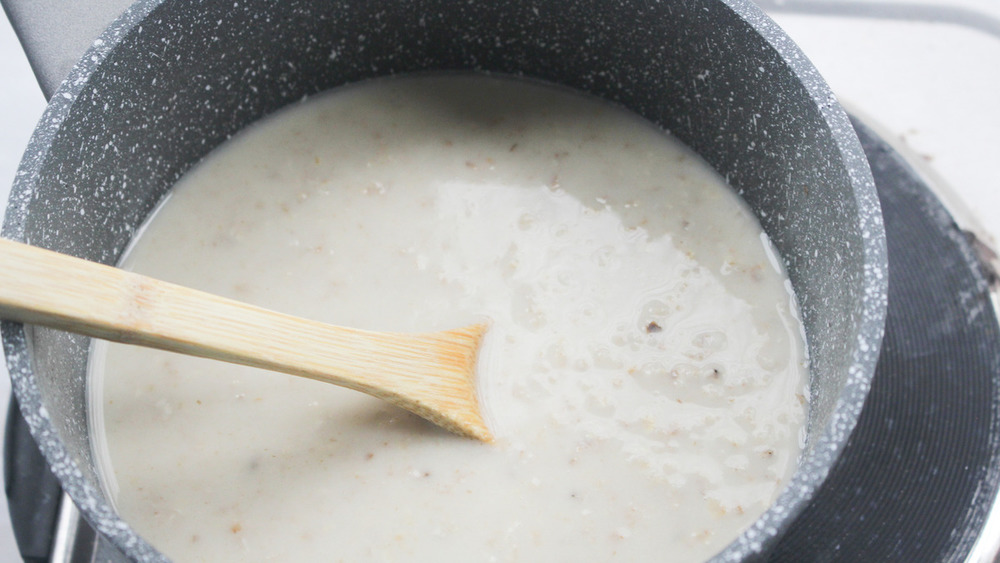 egg white oatmeal being stirred