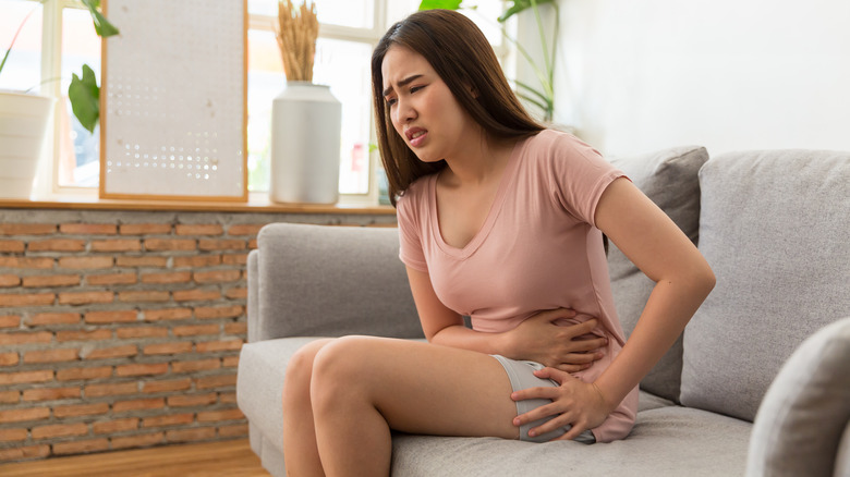 young woman with period pain