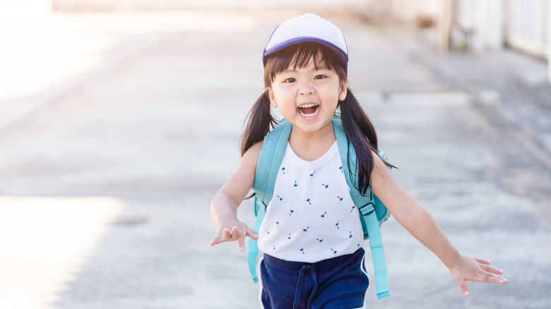 little kid going to school