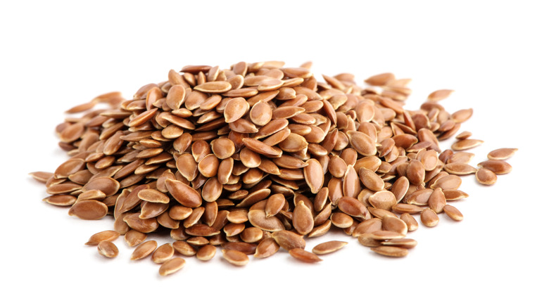 flaxseeds on white background