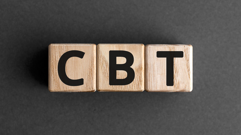 wooden blocks spelling out cbt 