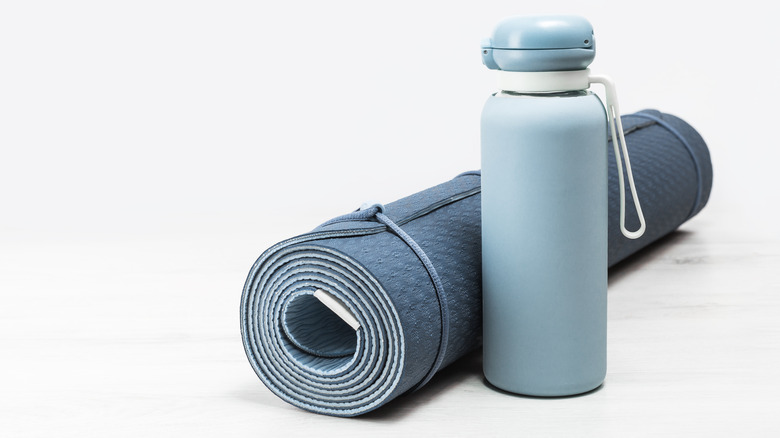 yoga mat with water bottle