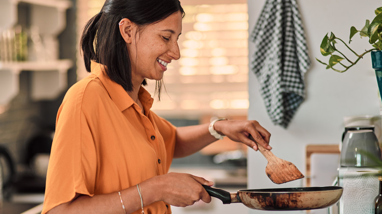 Woman preparing food at home