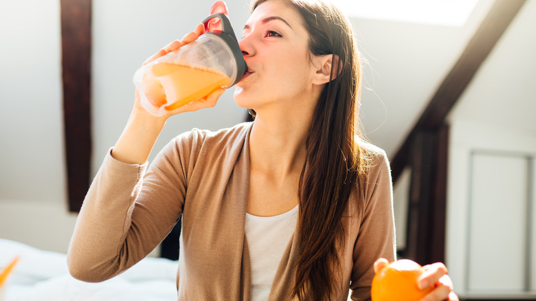 Woman drinking a fresh smoothie