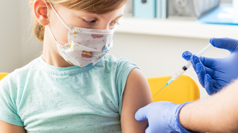 child getting a vaccine