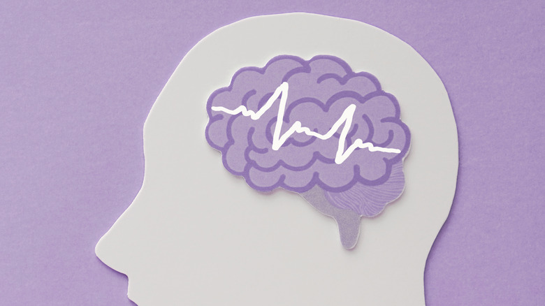 drawing of brain against purple background