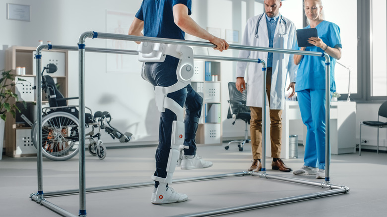 man walking during physical therapy