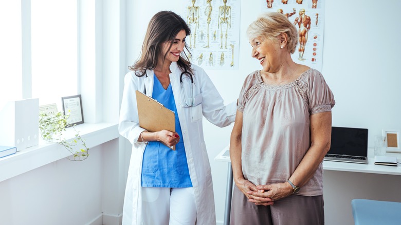 A doctor talking to her patient