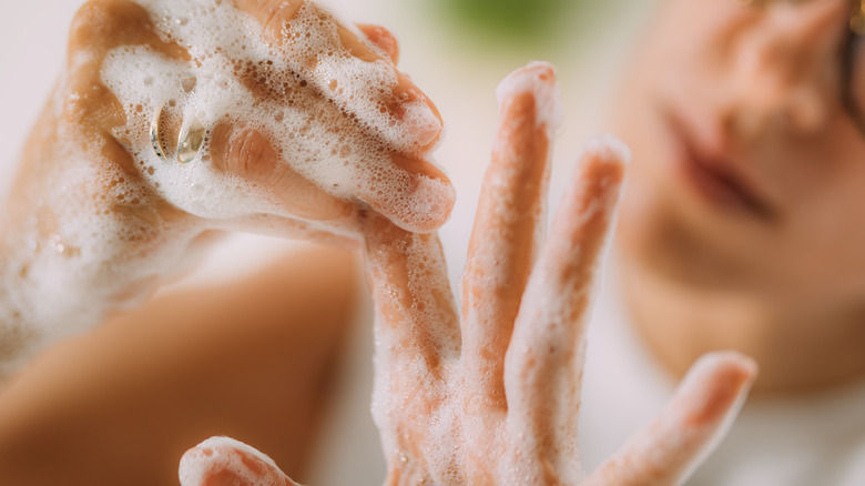 Person washing hands