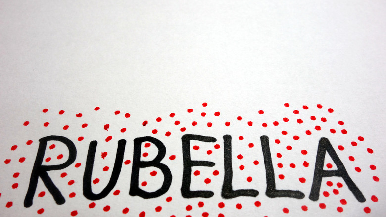 The word "rubella" written on paper