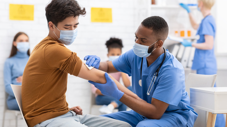 Patient gets vaccinated against COVID-19