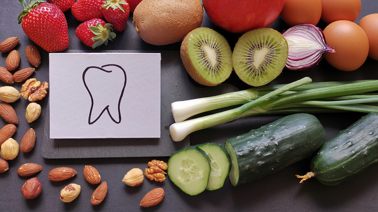 Drawing of a tooth surrounded by fresh food