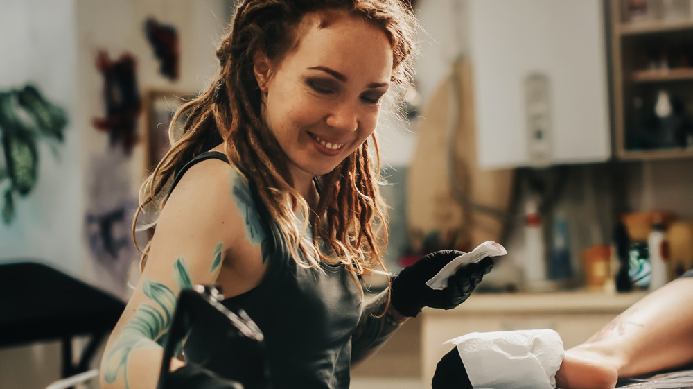 tattoo artist in parlor