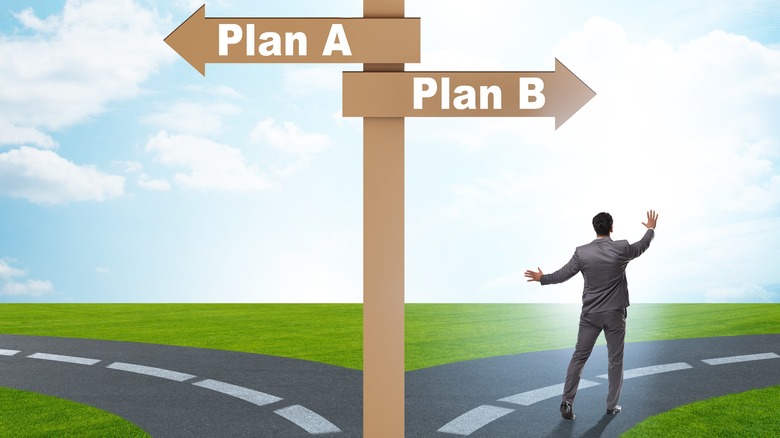 Man at intersection of Plan A and Plan B