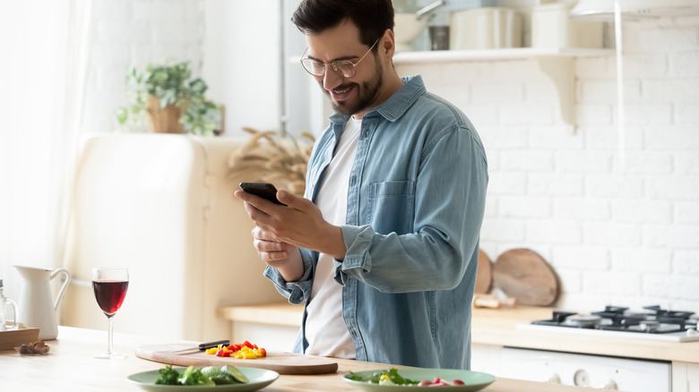 Man chopping vegetables