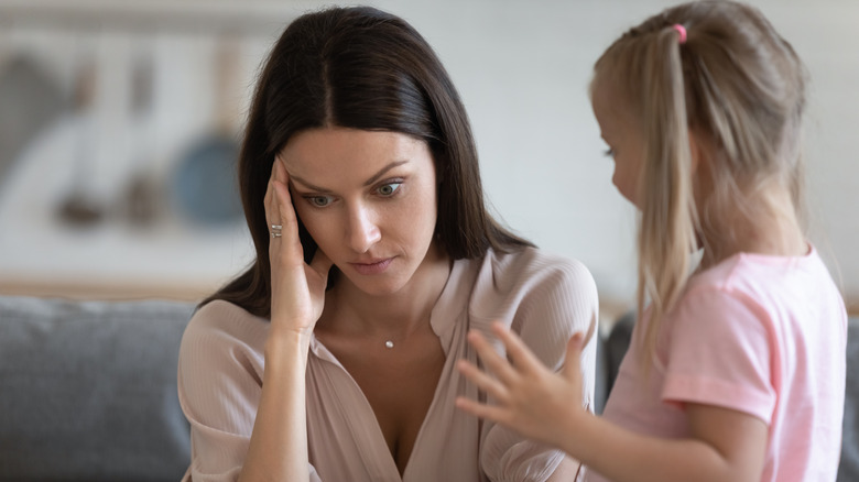 mother frustrated, daughter talking