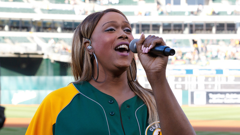 trans opera singer Breanna Sinclairé sings the national anthem at a baseball game