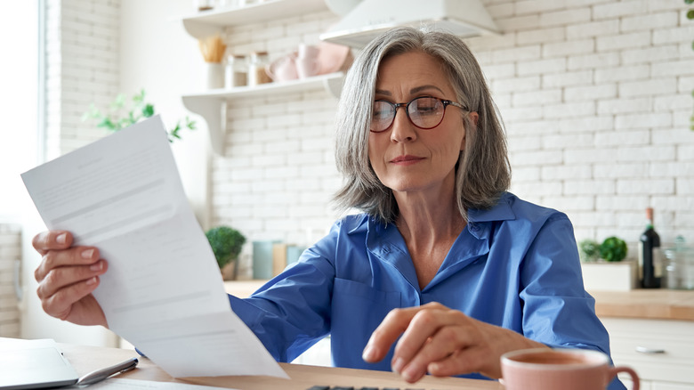 woman calculating budget