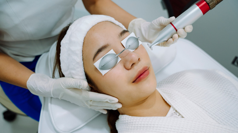 woman receiving a laser treatment