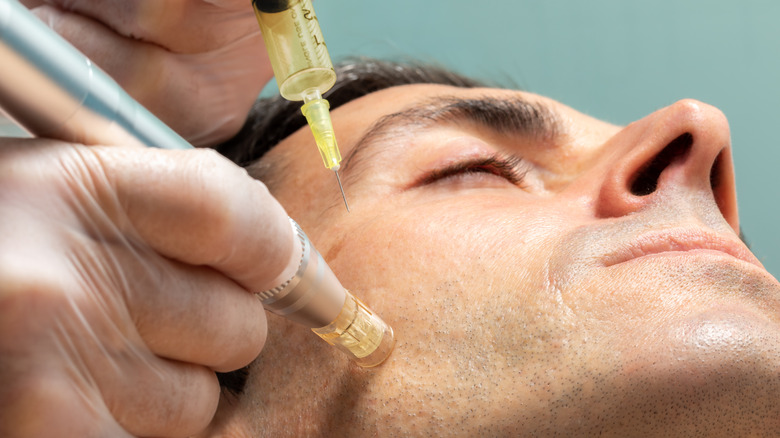 man getting facial injections