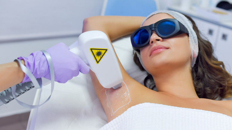 diode laser applied to woman's armpit