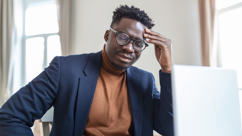 a man experiencing a headache