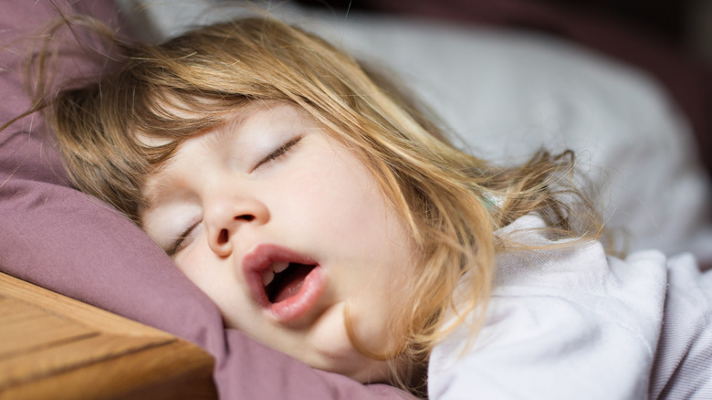 child sleeping with mouth open