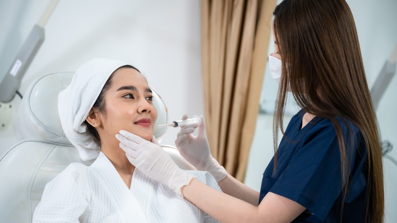 Woman receiving Botox treatment