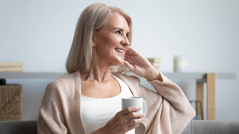 older lady drinking coffee