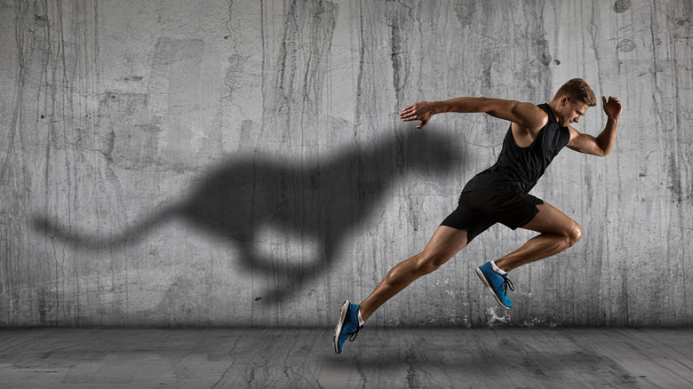 guy running fast with cheetah shadow