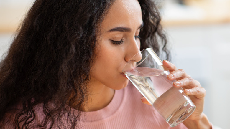 Woman drinking a glass of water