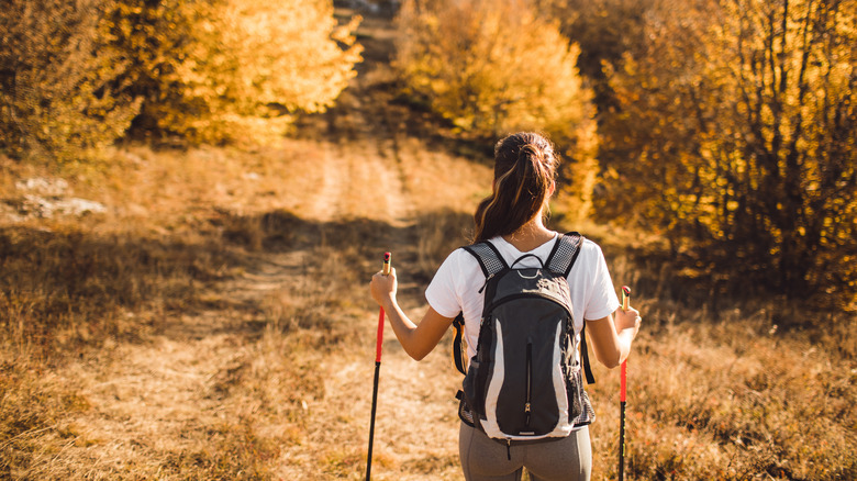 A woman Nordic walking