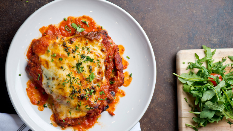 Chicken parmesan with arugula salad