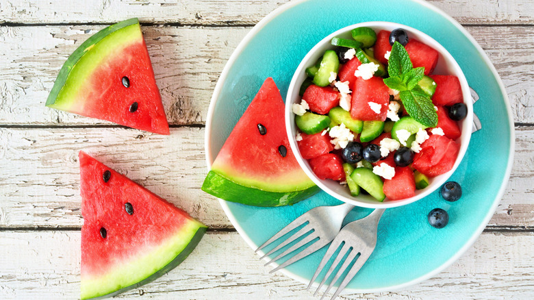 a bowl with chopped watermelon and feta cheese