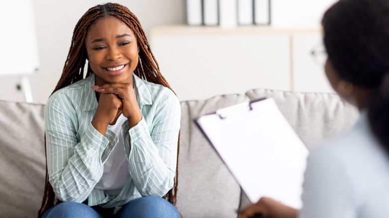 woman talking to therapist