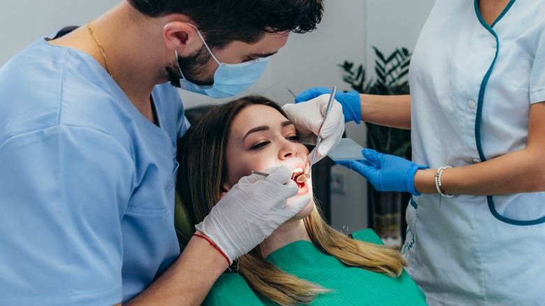 woman getting dental exam