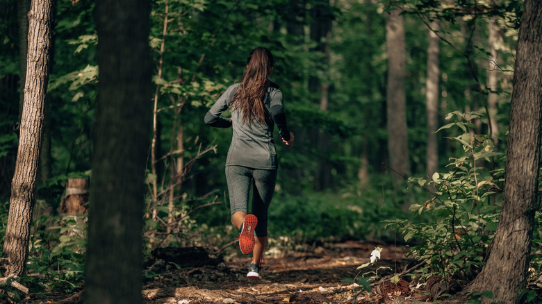 woman running on a trail
