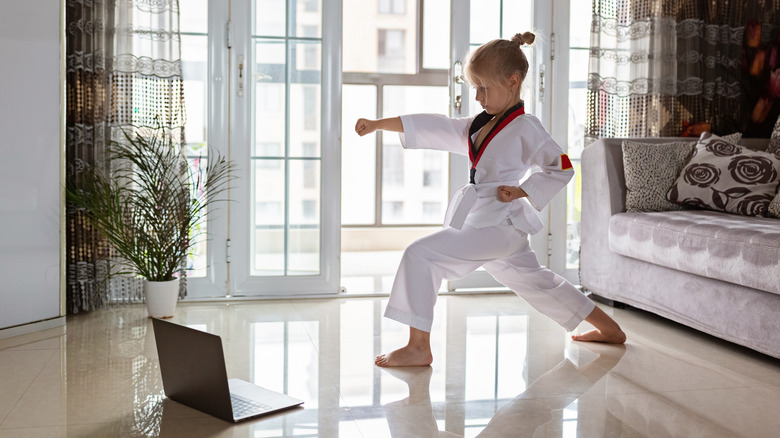 Girl doing martial arts virtually