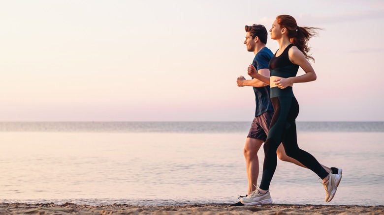 Couple running at the beach