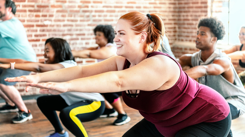 Group of people doing squats