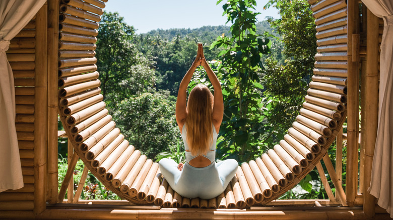 young girl doing outdoor yoga