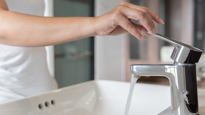 woman washing her hands