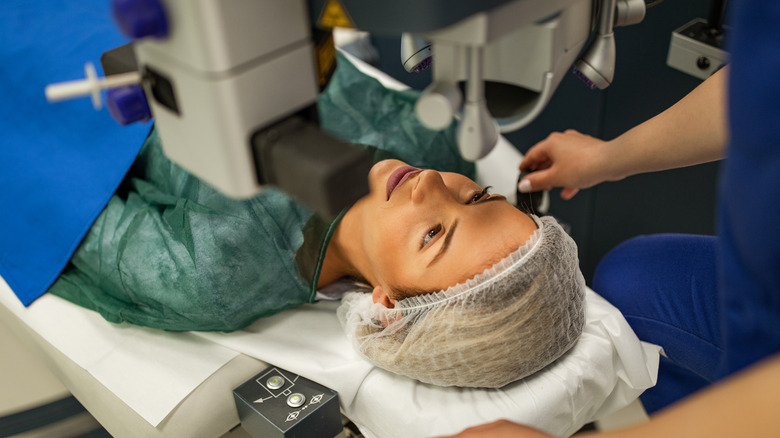 woman being prepared for eye surgery